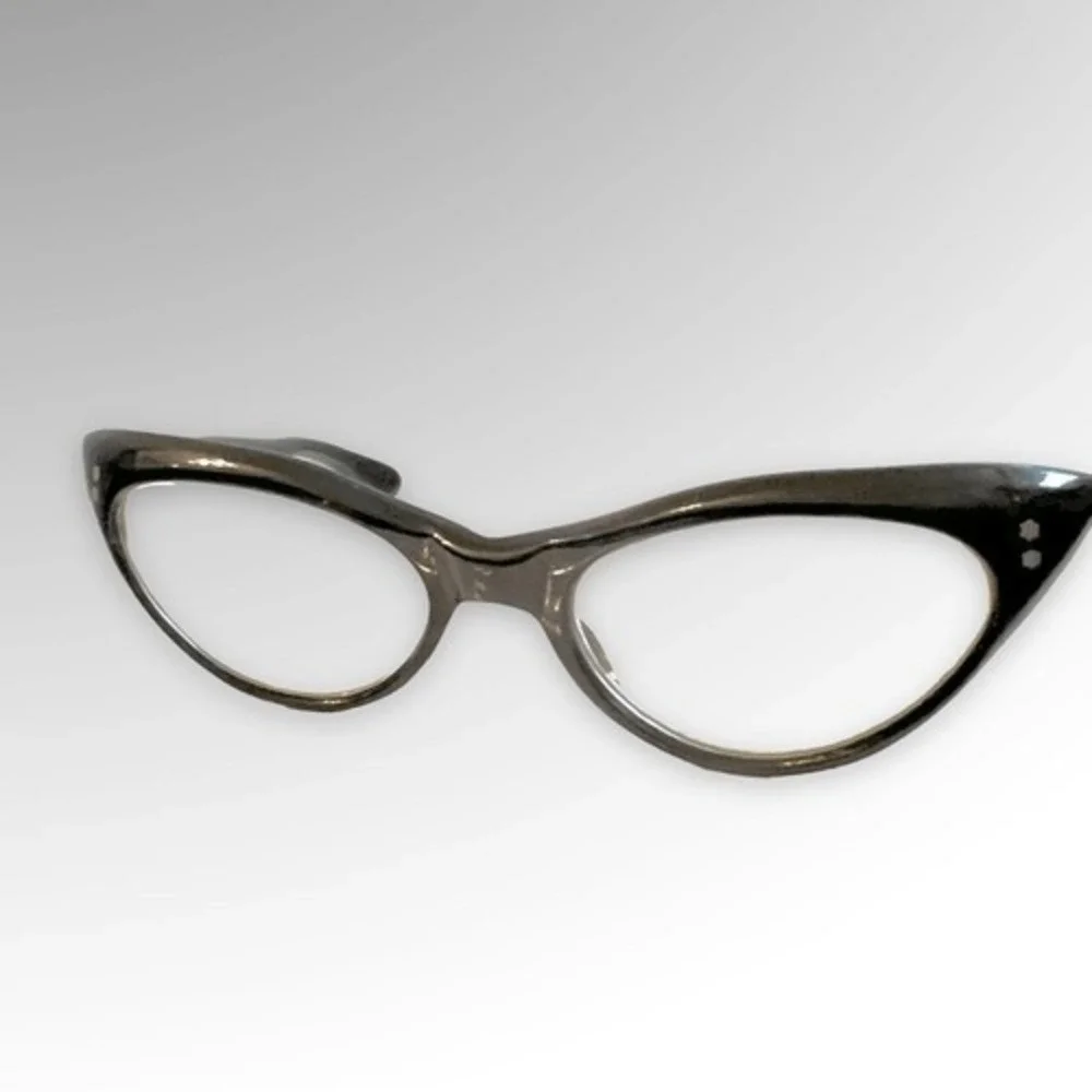 Vintage cat frame glasses by France Swank. Mint condition.